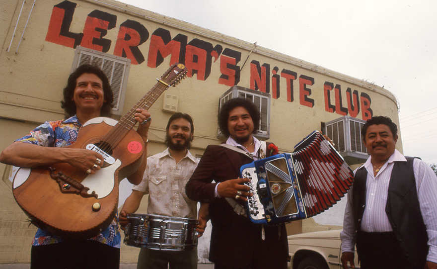 Conjunto musicians outside Lerma's Nite Club, 1602 North Zarzamora Street, San Antonio, Texas, early 1980s.