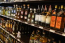 Shelves display bottles of tequila for sale at a liquor store