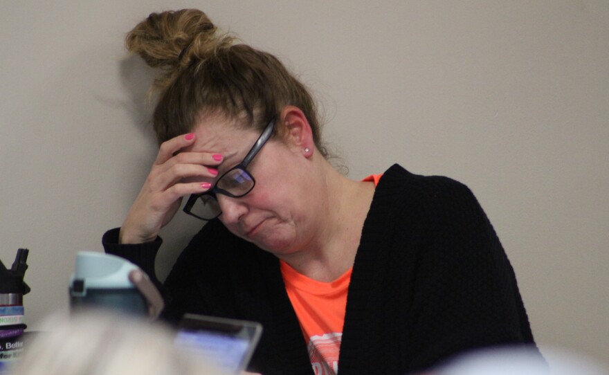 Deer River sixth grade teacher Jennifer Lind reacts to the School Board's rejection of a four-day school week in the high school media center on Feb. 11, 2026. Lind was on the committee that prepared the alternative schedule proposal.