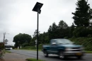 A car drives past an automatic license plate reader on Route 29 in Charlottesville on June 27, 2025.