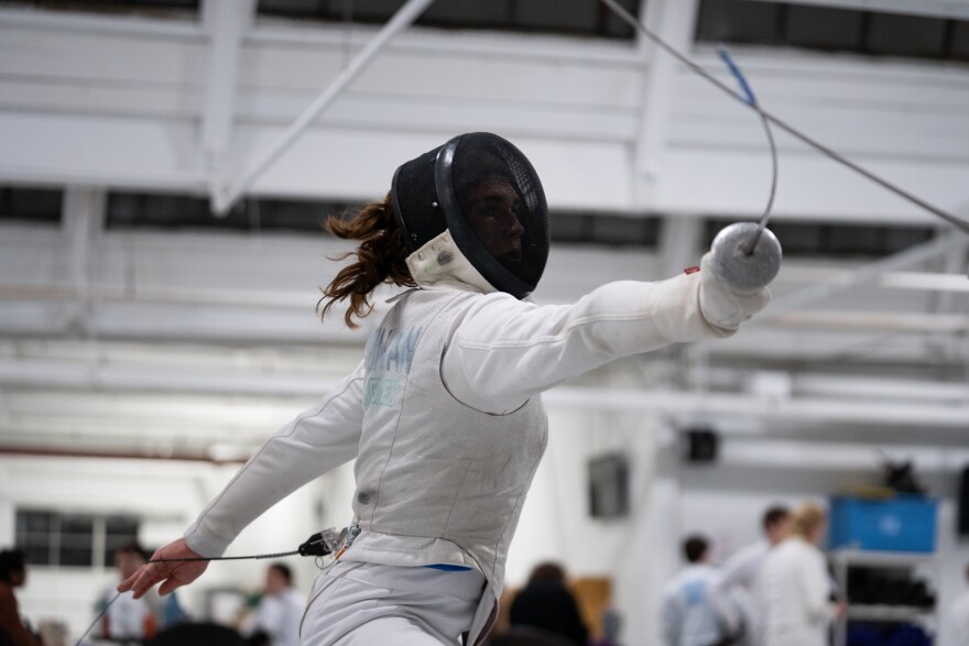 Sullivan lunges at her opponent in a practice bout at the Sword in the Scroll fencing club in Willimantic on Nov. 11, 2025.