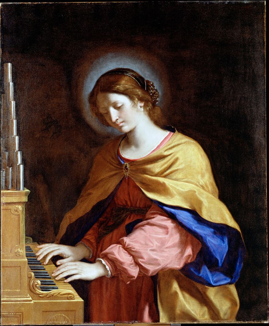 St. Cecilia playing the organ