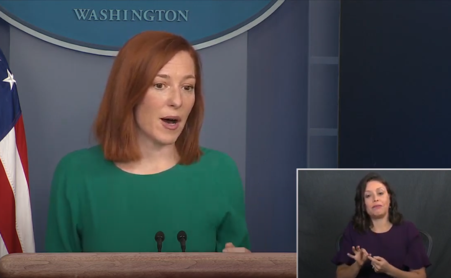 An ASL interpreter is seen on camera alongside White House press secretary Jen Psaki during Monday's press briefing.