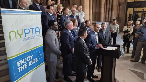 Miguel Velázquez, the president of the New York Public Transit Association, speaks at the State Capitol on Wednesday, March 25, 2026.