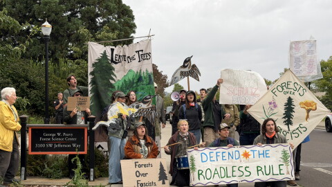 Protesters chant outside of George W. Peavy Forest Science Center at Oregon State University to object the removal of the roadless rule, Sept. 2, 2026.
