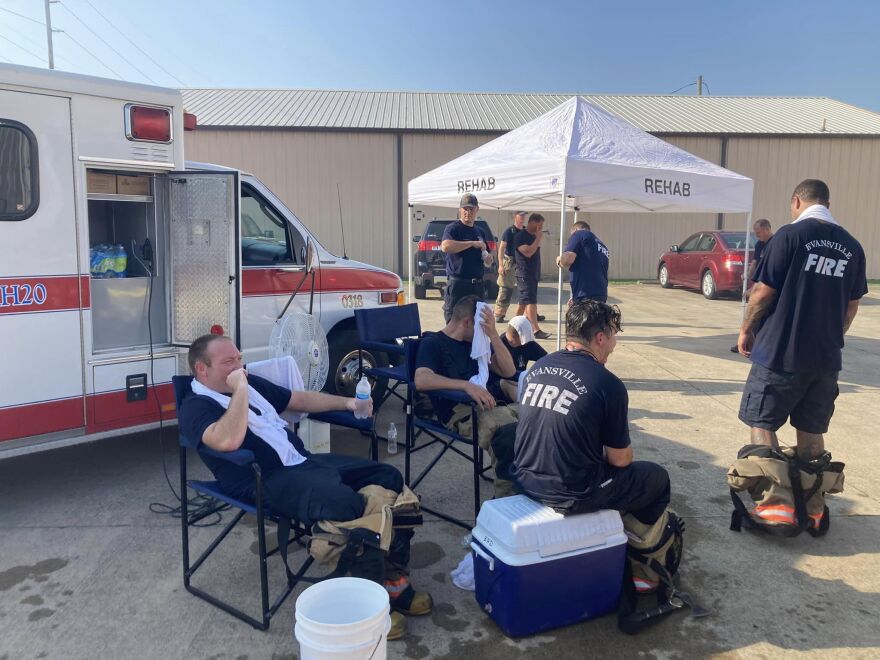 Evansville firefighters "rehab" after battling the fire at Tri-State Resource Recovery Friday morning