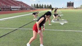 Girls line up for a snap at London High School. Its the schools' first season with a flag football team.