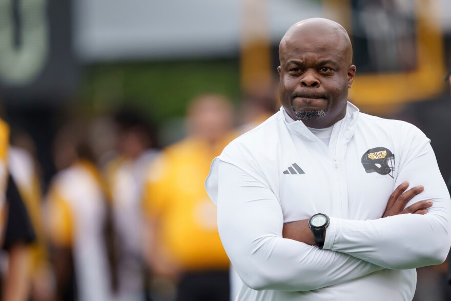 FILE - Southern Mississippi head coach Charles Huff watches his team before an NCAA football game against Mississippi State on Saturday, Aug. 30, 2025, in Hattiesburg, Miss. (AP Photo/Matthew Hinton, file)