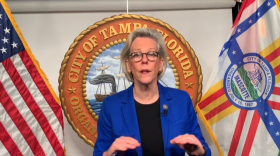 Jane Castor at podium