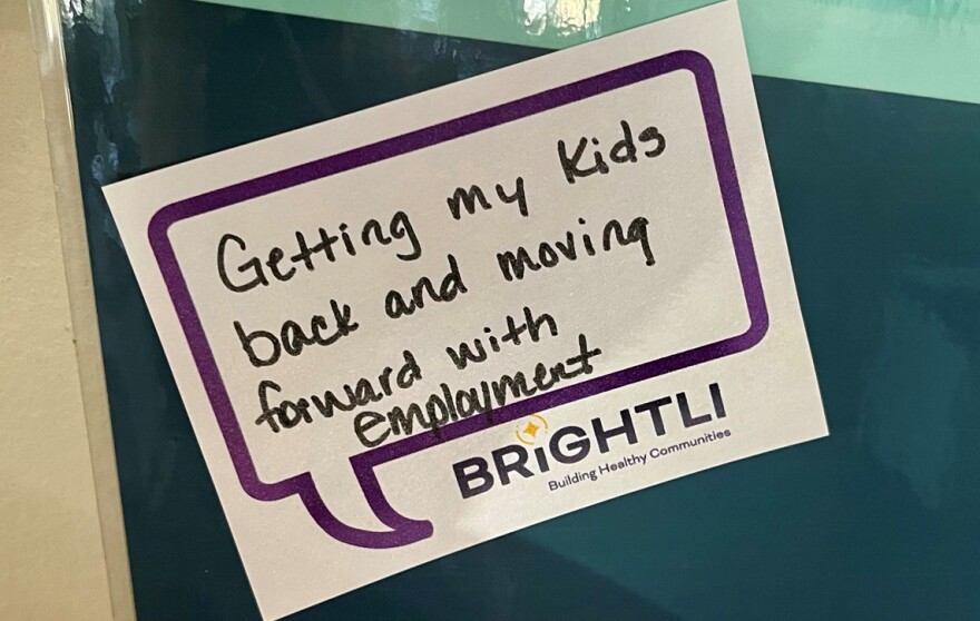 messages written by clients who shared their success stories about the program on a message board in their office.