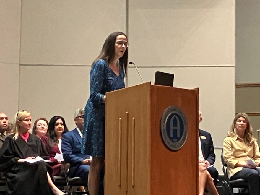 Augustana College president Andrea Talentino speaking at the naturalization ceremony for 71 new U.S. citizens, Tuesday, Sept. 15, 2026 at the college's Centennial Hall, Rock Island.