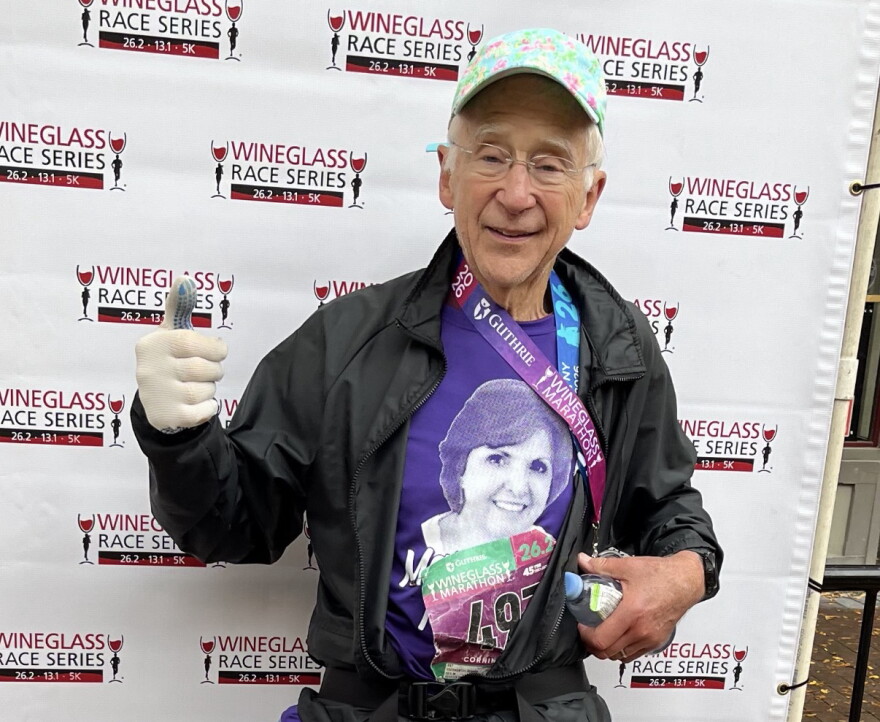 81-year-old George Chernowski finishes a marathon, raising thousands of dollars for families in need.