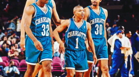 Muggsy Bogues with Charlotte Hornets teammates.