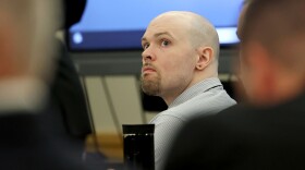 Defendant Tanner Horner looks up at his defense team before pleading guilty to capital murder in the November 2022 strangulation killing of 7-year-old Athena Strand on Tuesday, April 7, 2026, at the Tim Curry Criminal Justice Center in Fort Worth.