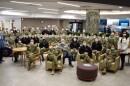 Navy medical staff pose with hospital staff at BJC Christian in north St. Louis County. The military members will be helping staff the hospital for 30 days.