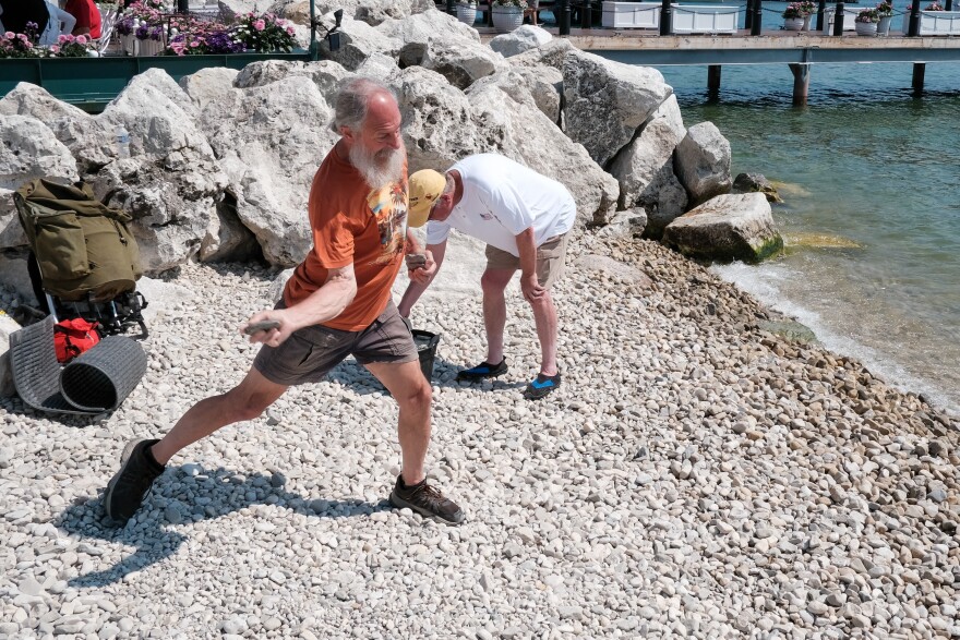  Kurt "Mountain Man" Steiner warms up in advance of the 55th Mackinac Island Stone Skipping Tournament on July 4, 2023. (credit: George Terrizzi / Points North)