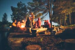 family around campfire