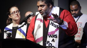 The Rev. Dr. William J. Barber II, center, and Rev. Dr. Liz Theoharis, left, co-chairs of the Poor People's Campaign, speak at the National Civil Rights Museum Tuesday, April 3, 2018, in Memphis, Tenn. They announced the campaign is preparing for 40 days of non-violent "direct action" in about 30 states that will climax with a rally in Washington this June. The organization is the rekindling of the campaign to help poor people that the Rev. Martin Luther King Jr. was working on when he was killed April 4, 1968, in Memphis. (AP Photo/Mark Humphrey)