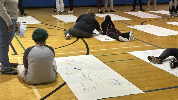 Kids work on self-reflection posters at a ReRoute workshop at the Marion Franklin Center, located at 2801 Lockbourne Road.