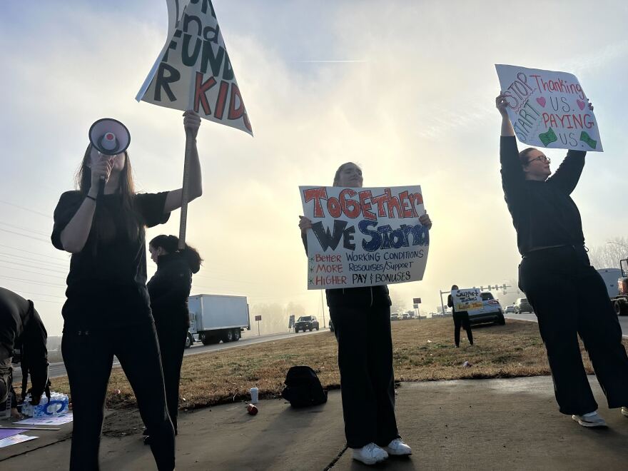 Teachers from Paw Creek Elementary School protest for better teacher pay.