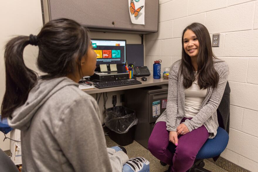 Photo of advisor and student.