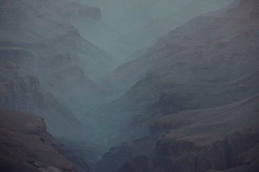 Smoke from the Dragon Bravo Fire moves down the Grand Canyon from the North Rim Tuesday, July 15, 2025, in Grand Canyon National Park, Ariz.