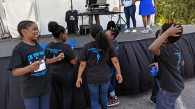 Talented young residents of the Providence Neighborhood prepare to strut their stuff on Saturday.