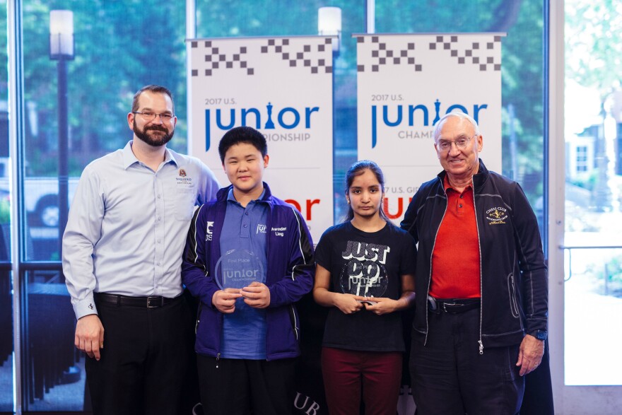 The winners of the 2017 U.S. Junior Championship, Awonder Liang and Akshita Gorti, with our executive director Tony Rich (left) and founder Rex Sinquefield (right).