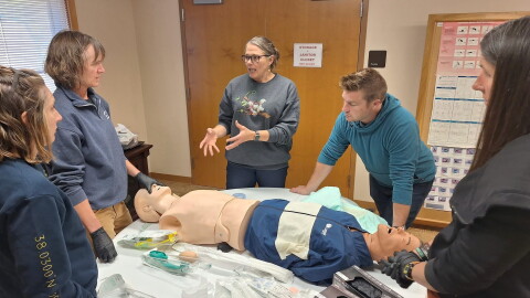 Buffy Witt, center, leading an EMS training at the Lake City Medical Center.