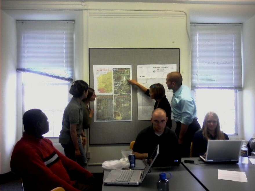 UB Architecture students discuss their project