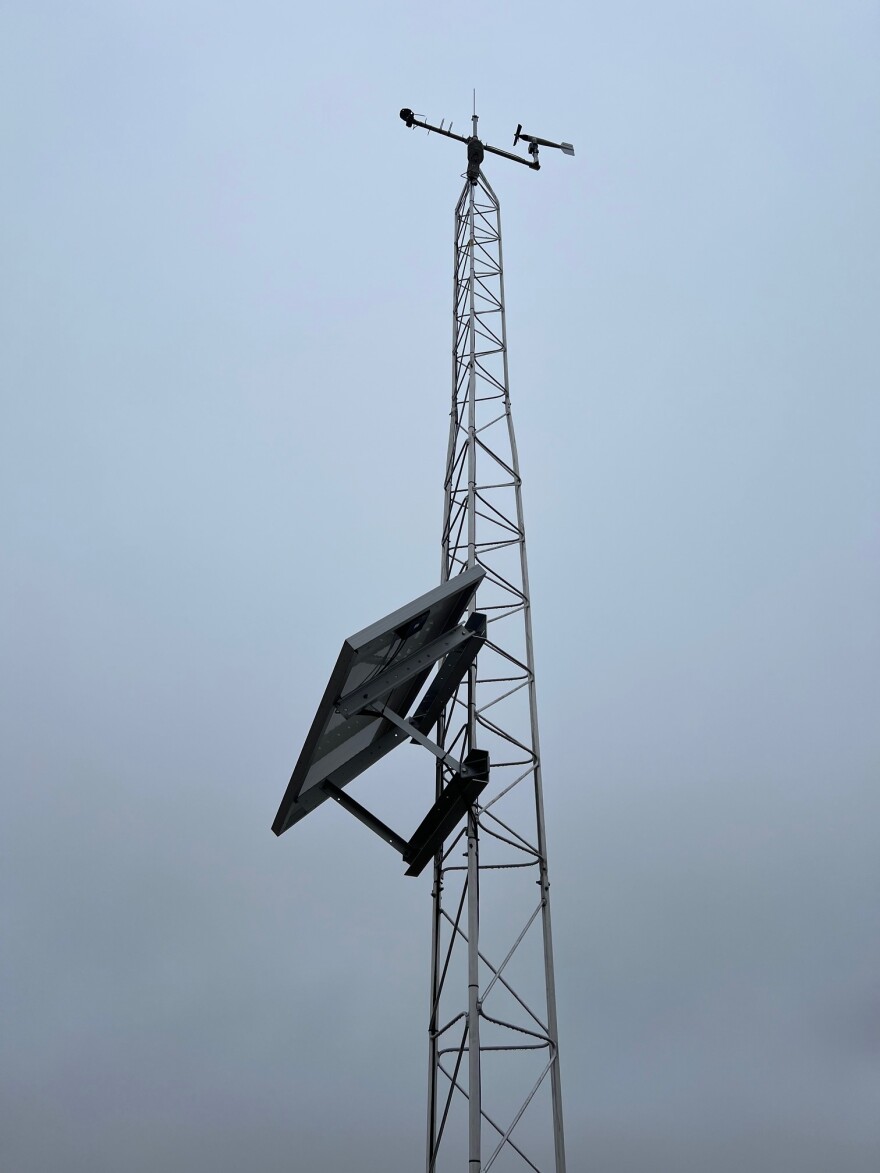 A 35-foot-tall tower reaches into the sky on an overcast day.