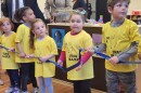 Children hold the ribbon for the official opening of the Marcella Nagorski-Waldow Center for Innovative Teaching and Learning at Luzerne County Community College on Friday.