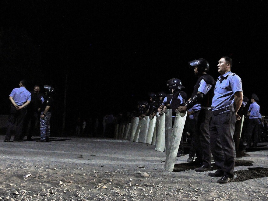 Police take security measures against former Kyrgyz President Almazbek Atambayev after the operation by Kyrgyz special forces to detain Atambayev at his rural residence became a deadly firefight in Koi-Tash near Bishkek, Kyrgyzstan, on Thursday.