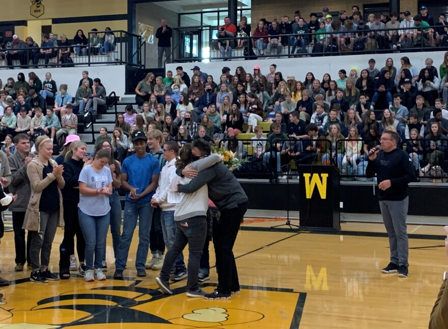 Moments after learning she was named the UHSAA 5A Coach of the Year Sami Graham is congratulated by family, her athletes and the Wasatch High School student body.