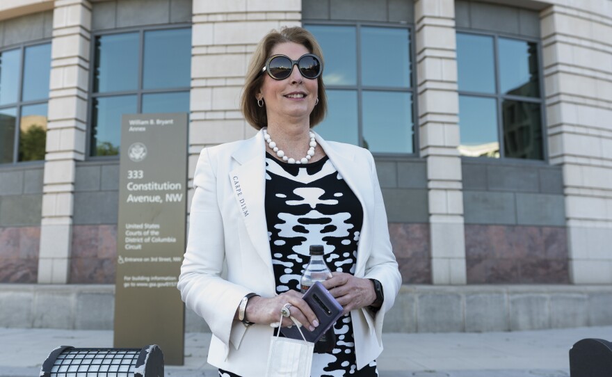 Former Trump attorney Sidney Powell leaves the Federal Court in Washington on June 24.