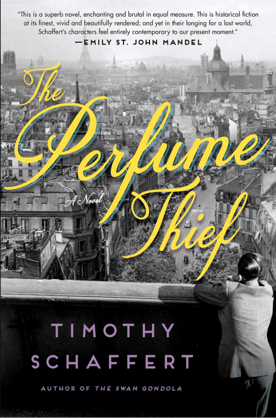 A book cover with yellow cursive text reading "The Perfume Thief" against a black and white photo of a balcony view of Paris. "Timothy Schaffert" is at the bottom in purple text.