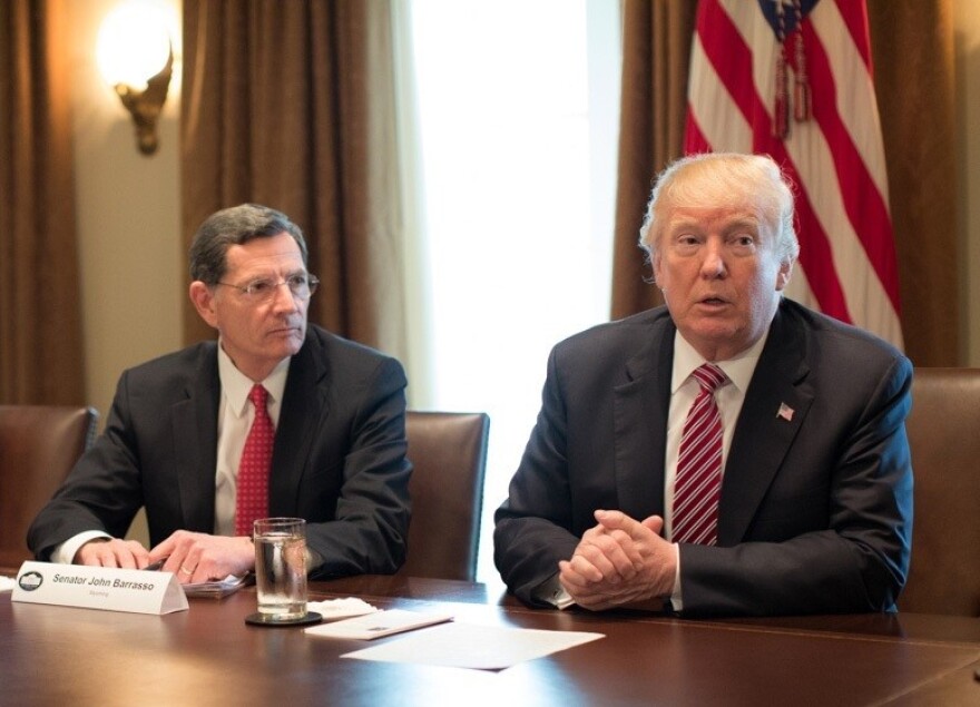 U.S. Senator John Barrasso, R-WY sitting next to President Donald Trump meeting with members of Congress in a bipartisan meeting to discuss infrastructure proposals in 2018