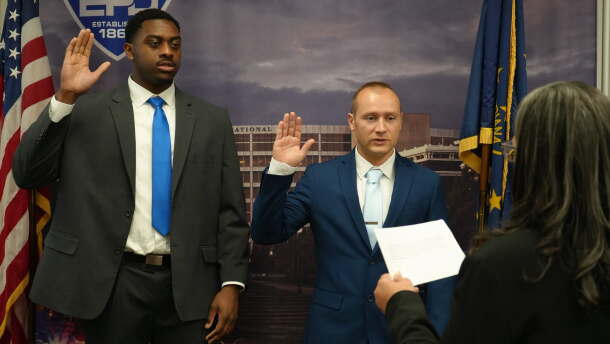Luscius Lloyd (left) and Daltyn Backes take the oath of office, joining the Evansville Police Department