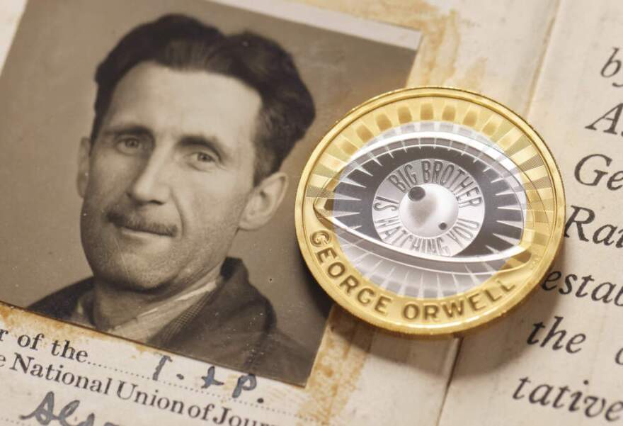 A portrait of George Orwell and a £2 coin. (The Royal Mint/PinPep via AP)