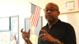 Vincent Flewellen leads a lesson on Ferguson during his eighth-grade multicultural studies course at Ladue Middle School.