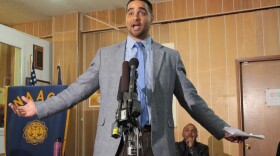 Garfield Teacher Jesse Hagopian says rising standards + inadequate education funding means minorities lose. Gerald Hankerson of the Seattle King County NAACP waits to speak.
