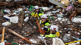 Members of the Tennessee Task Force One search and rescue team waded through Troublesome Creek in Perry County, searching for victims after one of the Gideon Rescue HR (Human Remains) Dogs 'hit' on an area jumbled with debris on Sunday, July 31, 2022