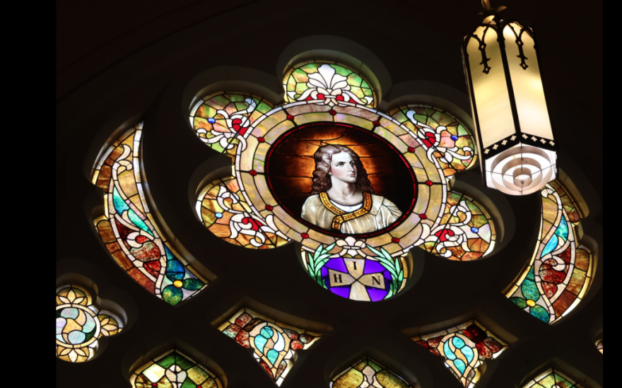 A stained-glass window in the sanctuary of St. John's United Methodist Church, Davenport, which will host a special benefit concert Sunday, June 7 at 3 p.m.