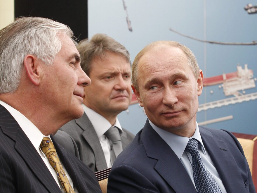 Russian President Vladimir Putin (right) and ExxonMobil CEO Rex Tillerson (left) attend a signing ceremony of an agreement between state-controlled Russian oil company Rosneft and ExxonMobil in 2012 at the Black Sea port of Tuapse, southern Russia.