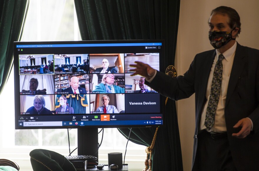 Ten Vermont Senators observe remotely as a quorum meets at the Statehouse to pass a measure to allow remote voting