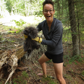 Charlie Mitchell, beaming with delight, holds a porcupine in Canada on August 19, 2018.