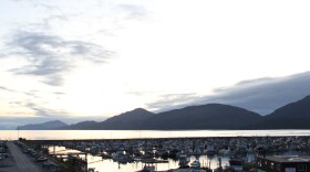 The sun sets over the harbor near downtown Cordova on Sunday, September 8, 2019. (Photo by Nat Herz / Alaska Public Media)