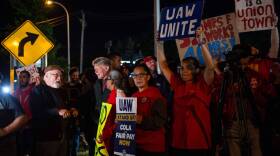 Members of the UAW (United Auto Workers) picket and hold signs outside of the UAW Local 900 headquarters across the street from the Ford Assembly Plant in Wayne, Michigan on Sept. 15, 2023. The US auto workers' union announced the start of a strike at three factories just after midnight on Friday, September 15, as a deadline expired to reach a deal with employers on a new contract. (Matthew Hatcher/AFP via Getty Images)
