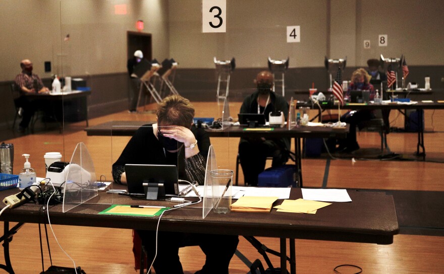 Voters cast their ballot