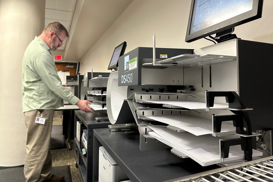Robert Hopkins of Lehigh County Voter Registration, works with ballot tabulators in a state-mandated recount of the U.S. Senate race at the Lehigh County Government Center in Allentown, Pa., Tuesday, Nov. 19, 2024.